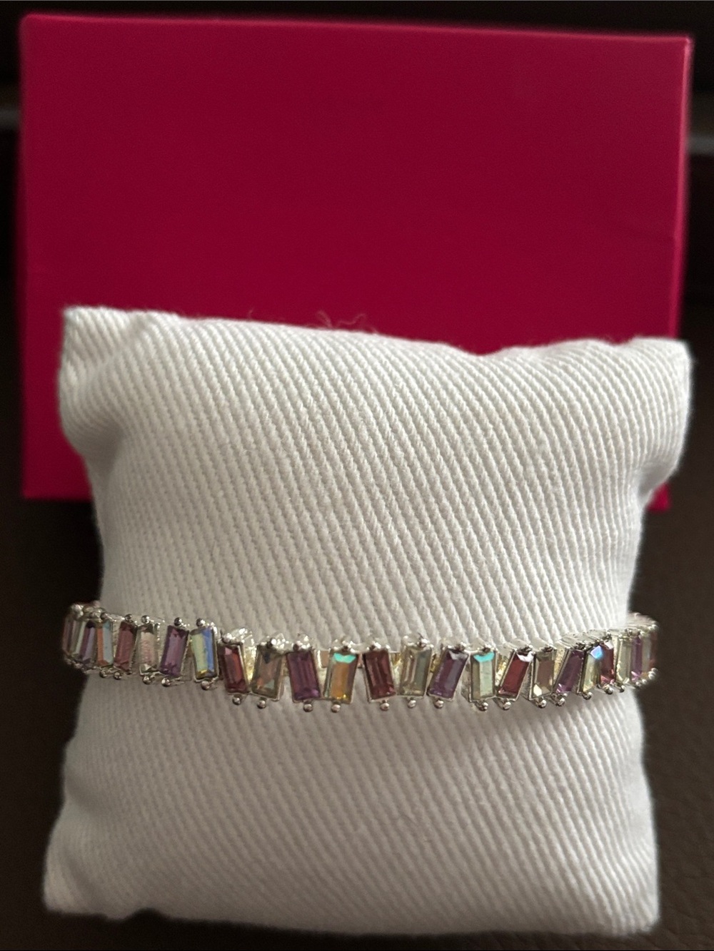 VINTAGE AVON SILVER-TONE CUFF BRACELET WITH MULTICOLORED BAGUETTE STONES
